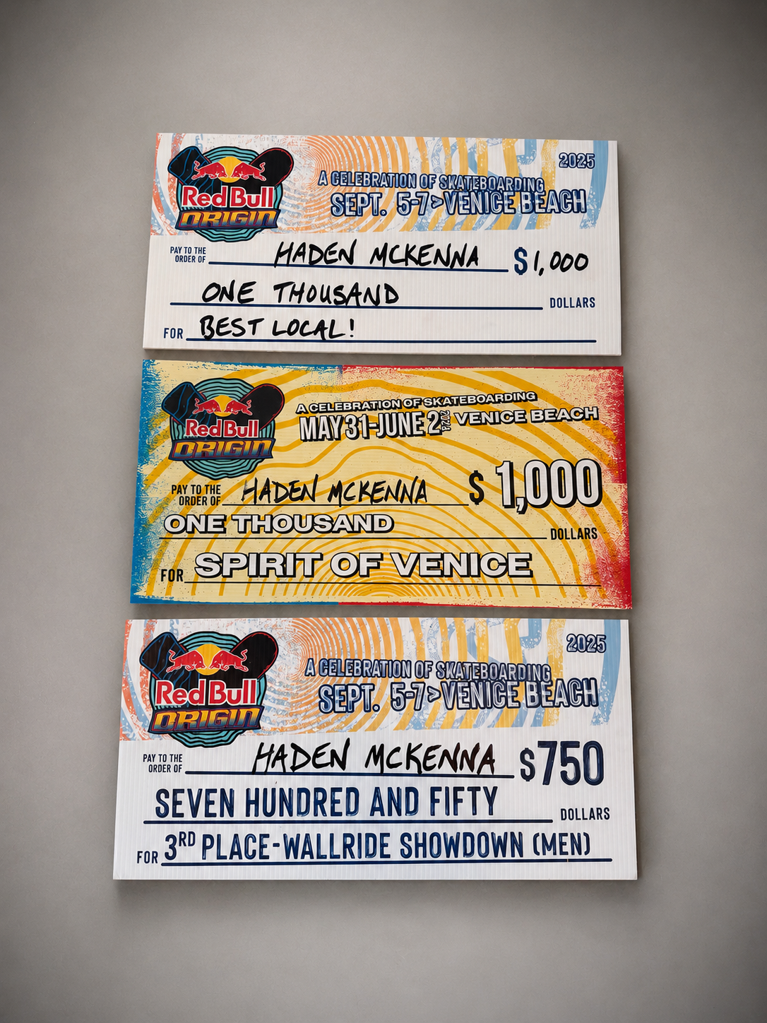 Red Bull Origin award checks earned by Haden McKenna at Venice Beach skateboarding events.